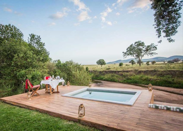 Looking out across a private plunge pool at Sala's Camp while on a Masai Mara safari in Kenya 
